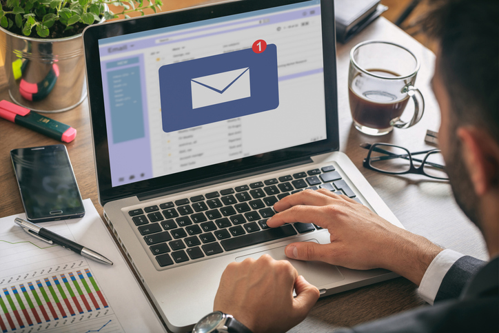 Email message inbox notification on laptop screen business background - Mspark Acquisition email